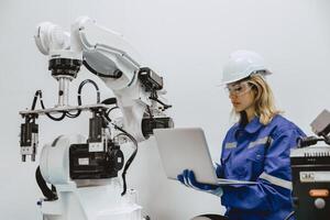 Engineer program robot machine in advance technology robotic factory industry, Service maintenance robot arm software photo