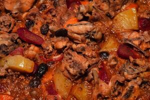 a close up of a stew with meat and vegetables photo
