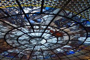 a large glass dome with a large painting on it photo