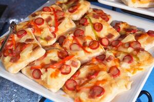 a plate of food with toppings on it photo