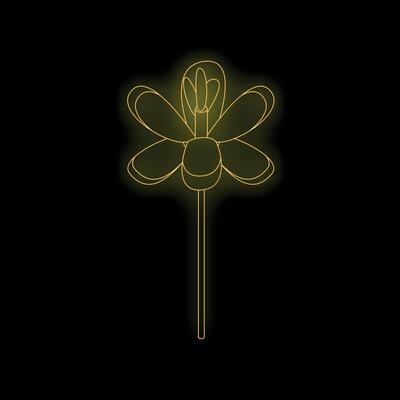 Golden neon sign showing a flower glowing on black background