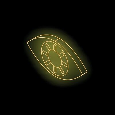 Neon yellow eye reflecting sun shining light in the dark
