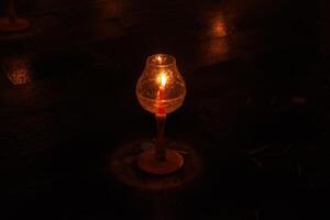 A large number of candles are lit for Vesak Day ceremony in Borobudur Temple, arranged in a row. photo