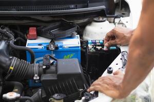 car service center mechanics are checking condition car and engine make sure they are ready use and in perfect condition according center warranty. periodic vehicle inspections for safety in driving. photo
