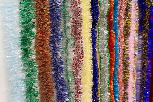 Varicoloured decorative ornaments for Christmas on a store window photo