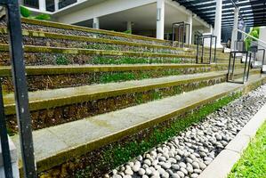 artificial waterfall with moss looks natural photo