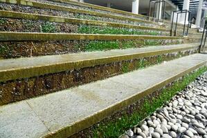 artificial waterfall with moss looks natural photo