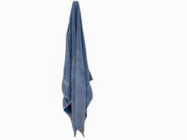 blue towel on a towel hook a against on white background photo