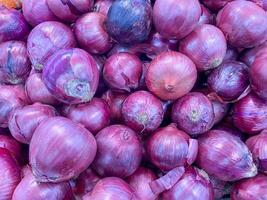 onions, collection of onions background. photo
