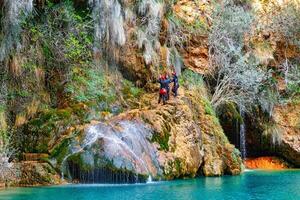 Spain, Valencia, March 29, 2024. Waterfall in Valencia in spring, rock climbing photo