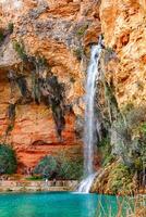 Spain, Valencia, March 29, 2024. Waterfall in Valencia in spring, rock climbing photo