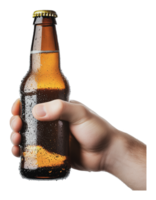 Hand holding a cold beer bottle in warm weather png
