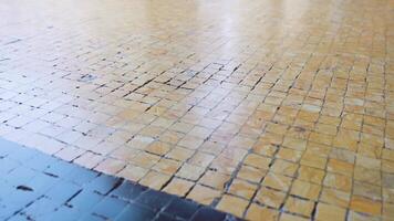 Square cobblestone with rough texture shining under sunlight video