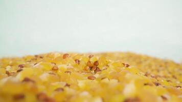 Pile of corn and chia beans mixture on surface of studio video