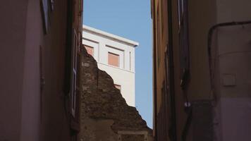 White building corner looks out of ruined ancient structure video