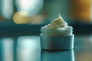 Open container of moisturizing face cream is reflecting light photo