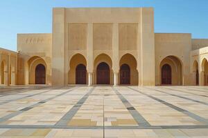 Large courtyard leading to the entrance of a mosque photo