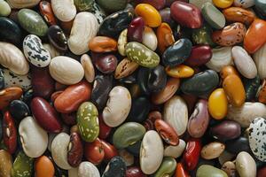 Multicolored beans forming a textured background of healthy food photo