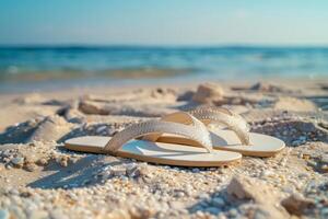 Elegant flip flops resting on a tropical beach shore photo