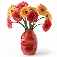 Bouquet of red and yellow gerbera daisies standing in red vase photo