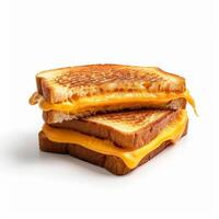 Toasted grilled cheese sandwich oozing melted cheddar cheese from between slices of bread photo