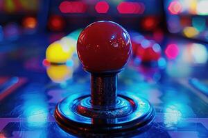 Red joystick standing out from the crowd in arcade game machine photo