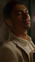 A Thoughtful and Contemplative Moment Set Within a Stylish and Trendy Environment video