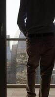 Take in the wonderful cityscape view from a highrise building, where the skyline meets the sky video