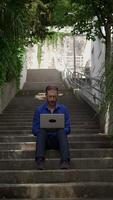 Remote Work Experiencing Modern Life While Relaxing on Outdoor Steps and Enjoying Nature video
