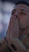 An Emotional Moment of Deep Reflection Occurs in an Urban Setting Amidst Busy Life video