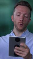 Engaging a Young Male User Utilizing a Tablet in a Modern and Dynamic Environment Today video
