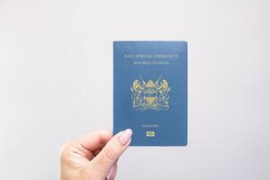 Passport Kenya Held Against Simple White Background. Astana, Kazakhstan, 26 october 2024 photo