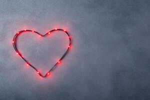 heart shape glowing frame . photo