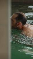 A Man Swimming in a Pool A Beautiful Blend of Serenity, Motion, and Freedom Unleashed video