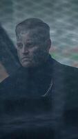 A mysterious figure shrouded in fog creates an intriguing atmosphere in an urban environment video