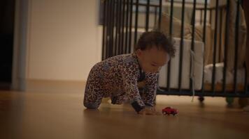 A Crawling Baby is Joyfully Playing with a Colorful Toy in a Cozy and Inviting Home Environment video