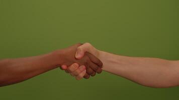 A diverse array of hands coming together to shake on the principles of unity and collaboration video