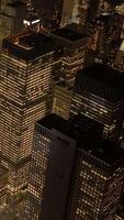 Experience the Stunning Night View of a Vibrant Cityscape with Beautiful Illuminated Skyscrapers video