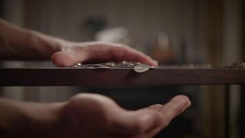 Hands Skillfully Balancing Various Objects on a Beautiful Wooden Surface Setting video