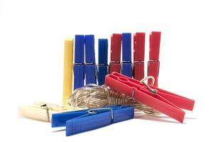 A pile of clothes pegs with a string photo