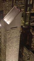 A Stunningly Dramatic Aerial View of a Modern Skyscraper Captured Beautifully at Night Time video