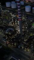 An Aerial View of an Illuminated Industrial Complex Operating at Nighttime with Lights video