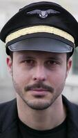 A welldressed pilot in uniform is portrayed, emphasizing professionalism and elegance video