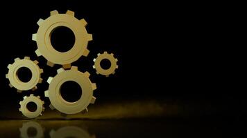 The Gold gear in Black Background for technology or Abstract concept 3d rendering. photo