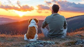 Peaceful moment of digital detox, a man and his dog connecting with nature at sunset. photo