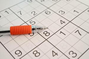 Sudoku puzzle, game to play for keep you brain younger for developing Alzheimer disease in senior patient. photo