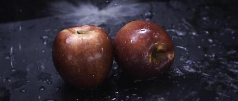 Red apple was wet with water splash, photo