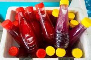 Assorted Beverages Chilling in Ice Box for Ultimate Refreshment on Hot Days at Nonthaburi, Thailand photo