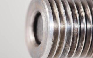 Electric motor part pulley for belt drive, macro. Copy space for text photo