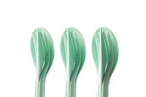 Compact set of cutlery on a white background, isolate, for trips and on the road, close-up photo